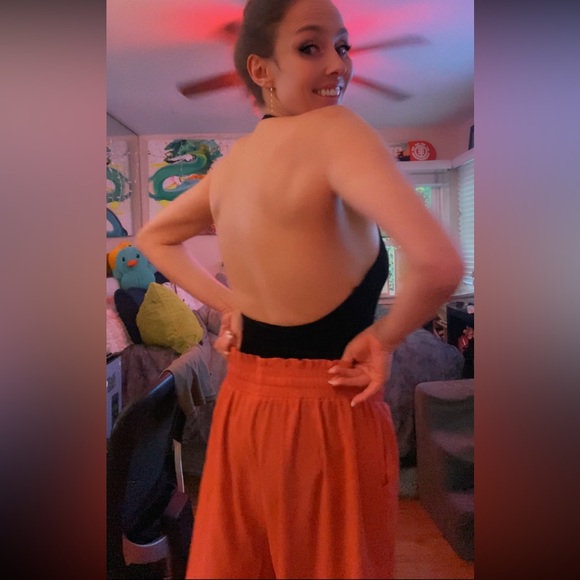 Elegant Black Top with Flowing Coral Pants - Picture 11 of 17